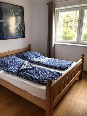 Ein Bett oder Betten in einem Zimmer der Unterkunft Ferienwohnung Kristin Brixen im Thale