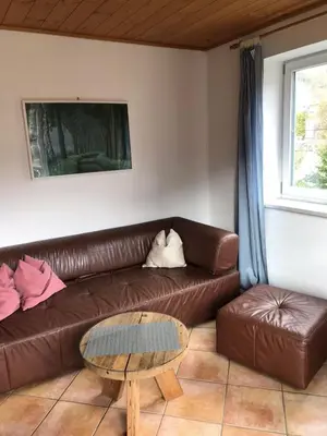 Ein Sitzbereich in der Unterkunft Ferienwohnung Kristin Brixen im Thale