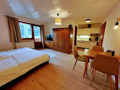 Ein Bett oder Betten in einem Zimmer der Unterkunft Zirmweg Appartements