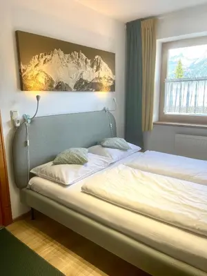 Ein Bett oder Betten in einem Zimmer der Unterkunft Villa Edyta Ellmau