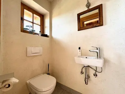 Ein Badezimmer in der Unterkunft 5* Panorama Chalet mit Sauna by Belle Stay