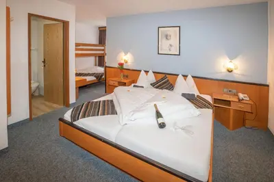 Ein Bett oder Betten in einem Zimmer der Unterkunft Hotel Untermetzger
