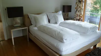 Ein Bett oder Betten in einem Zimmer der Unterkunft Haus Beatrice