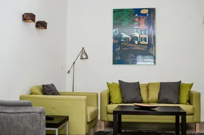 Ein Sitzbereich in der Unterkunft Apartments Blaickner