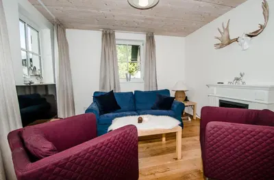 Ein Sitzbereich in der Unterkunft Apartments Blaickner