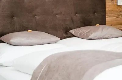 Ein Bett oder Betten in einem Zimmer der Unterkunft Apartments Blaickner