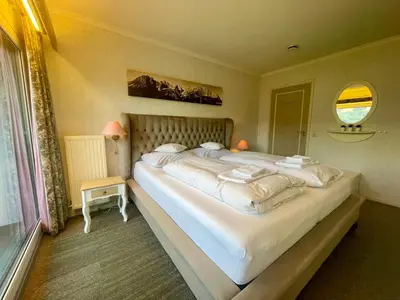Ein Bett oder Betten in einem Zimmer der Unterkunft Apartment Berghof Ellmau