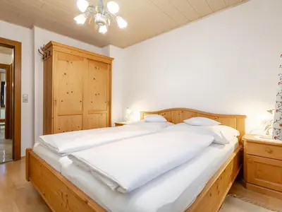 Ein Bett oder Betten in einem Zimmer der Unterkunft Schleicherhof III