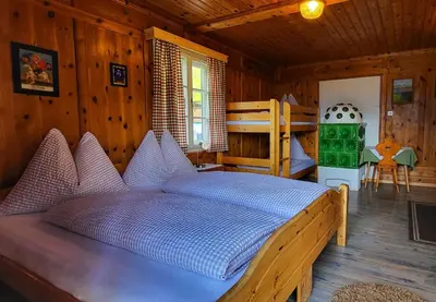 Ein Bett oder Betten in einem Zimmer der Unterkunft Berghotel Breitmoos