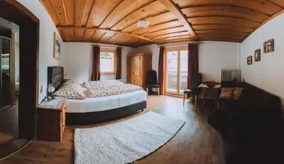 Ein Bett oder Betten in einem Zimmer der Unterkunft Berghotel Breitmoos