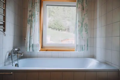Ein Badezimmer in der Unterkunft Berghotel Breitmoos