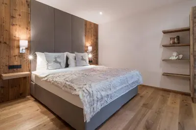 Ein Bett oder Betten in einem Zimmer der Unterkunft Premium Apartment Zentral by Alpine Host Helpers