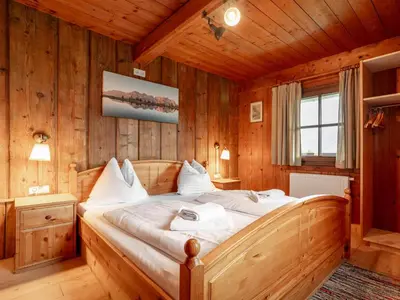 Ein Bett oder Betten in einem Zimmer der Unterkunft Weberhäusl am Penningberg