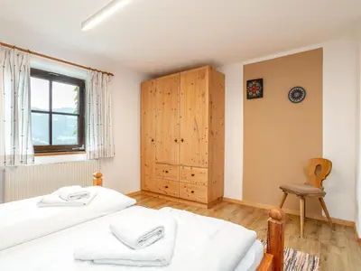 Ein Bett oder Betten in einem Zimmer der Unterkunft Weberhäusl am Penningberg