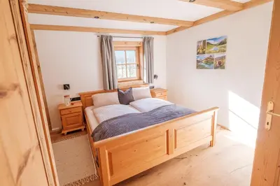 Ein Bett oder Betten in einem Zimmer der Unterkunft Ferienwohnung Kirchern