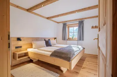 Ein Bett oder Betten in einem Zimmer der Unterkunft Ferienwohnung Kirchern