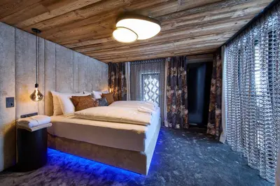 Ein Bett oder Betten in einem Zimmer der Unterkunft NANI - Mountain Chalet