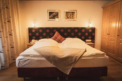 Ein Bett oder Betten in einem Zimmer der Unterkunft Gästehaus Einödberg