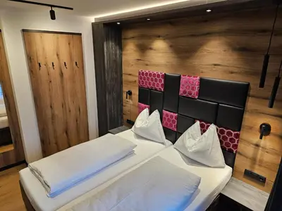 Ein Bett oder Betten in einem Zimmer der Unterkunft Chalet in Zillertal near Ski Slopes & Whirlpool
