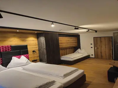 Ein Bett oder Betten in einem Zimmer der Unterkunft Chalet in Zillertal near Ski Slopes & Whirlpool