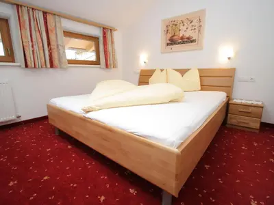 Ein Bett oder Betten in einem Zimmer der Unterkunft Stylish Flats in Uderns near Ski Lift