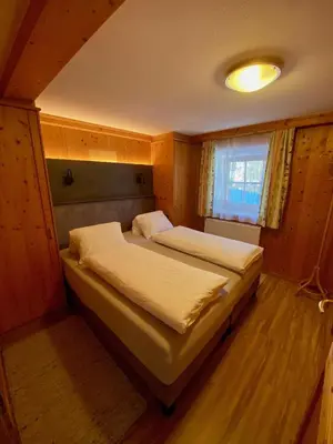 Ein Bett oder Betten in einem Zimmer der Unterkunft Neuwalder
