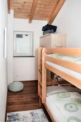 Ein Bett oder Betten in einem Zimmer der Unterkunft Apart Emilia