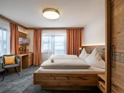 Ein Bett oder Betten in einem Zimmer der Unterkunft Adelsbergers Bergland