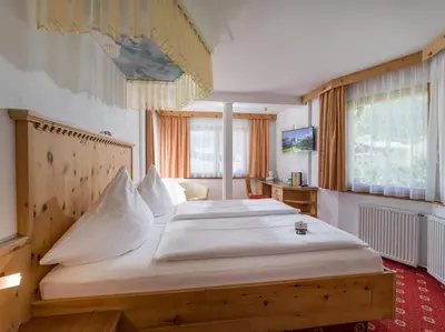 Ein Bett oder Betten in einem Zimmer der Unterkunft Adelsbergers Bergland
