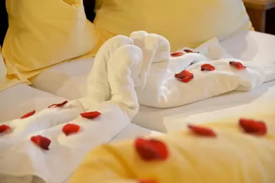 Ein Bett oder Betten in einem Zimmer der Unterkunft Hotel Garni Bavaria