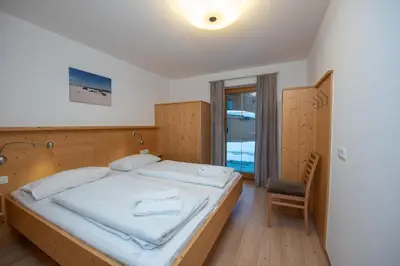 Ein Bett oder Betten in einem Zimmer der Unterkunft Almhäuser Filzsteinalpe Almhaus 201
