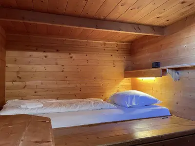 Ein Bett oder Betten in einem Zimmer der Unterkunft Haus Hölzlbauer Top 5