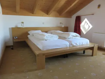 Ein Bett oder Betten in einem Zimmer der Unterkunft Haus 129 Top 3