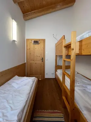 Ein Bett oder Betten in einem Zimmer der Unterkunft Filzsteinanger 224 Top 4