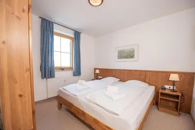 Ein Bett oder Betten in einem Zimmer der Unterkunft Haus Filzstein 144 Top 18