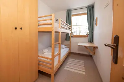 Ein Bett oder Betten in einem Zimmer der Unterkunft Haus Filzstein 144 Top 18