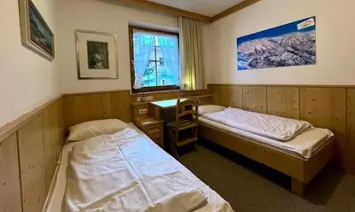 Ein Bett oder Betten in einem Zimmer der Unterkunft Chalet Alpine Royal B Top 24