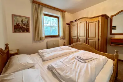 Ein Bett oder Betten in einem Zimmer der Unterkunft Chalet Alpine Royal B Top 24