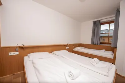 Ein Bett oder Betten in einem Zimmer der Unterkunft Duxeranger C Top 8