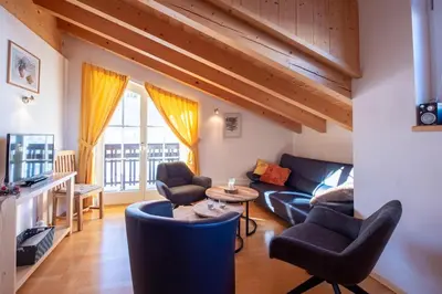 Ein Sitzbereich in der Unterkunft Haus 130 Top 3