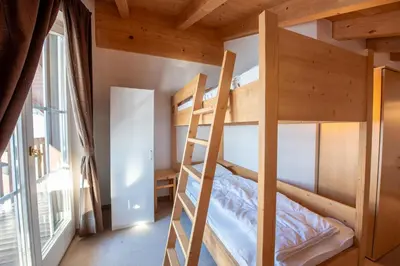 Ein Bett oder Betten in einem Zimmer der Unterkunft Haus 130 Top 3