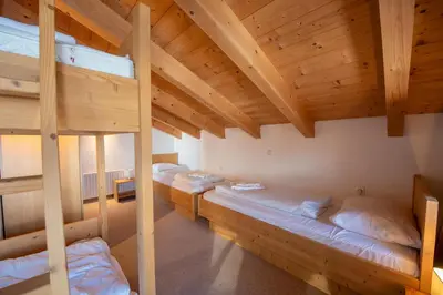 Ein Bett oder Betten in einem Zimmer der Unterkunft Haus 130 Top 3