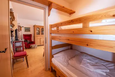 Ein Bett oder Betten in einem Zimmer der Unterkunft Haus Filzstein 117 Top 2