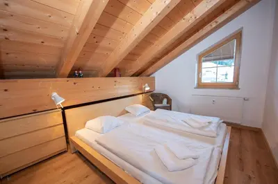 Ein Bett oder Betten in einem Zimmer der Unterkunft Haus Filzstein 145 Top 25
