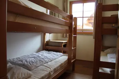 Ein Bett oder Betten in einem Zimmer der Unterkunft Duxeranger D Top 5