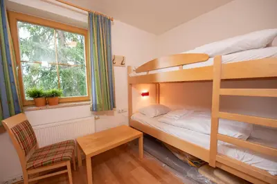 Ein Bett oder Betten in einem Zimmer der Unterkunft Haus Filzstein 135 Top 3