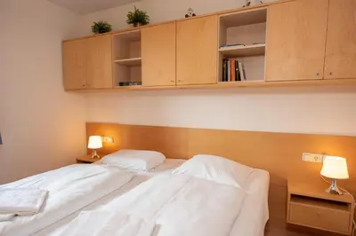 Ein Bett oder Betten in einem Zimmer der Unterkunft Haus Filzstein 135 Top 3