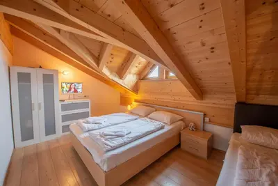 Ein Bett oder Betten in einem Zimmer der Unterkunft Almhäuser Filzsteinalpe Almhaus 198
