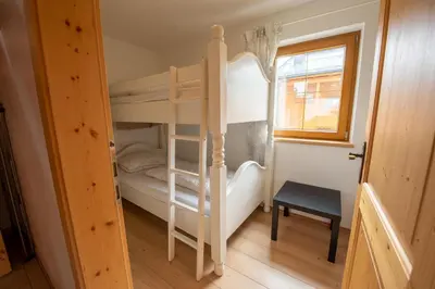 Ein Bett oder Betten in einem Zimmer der Unterkunft Almhäuser Filzsteinalpe Almhaus 198