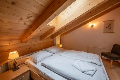 Ein Bett oder Betten in einem Zimmer der Unterkunft Almhäuser Filzsteinalpe Almhaus 198